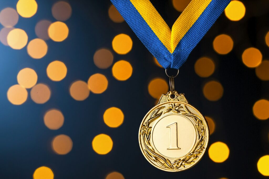 Gold champion or winners medallion on a ribbon