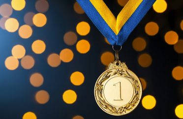 Gold champion or winners medallion on a ribbon